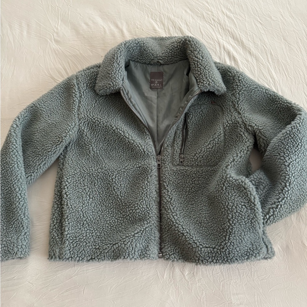 Cozy sherpa zip up with gun metal color zipper detailing - teal grey